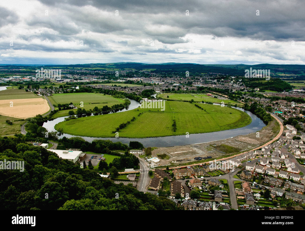 Aerial shot of River Forth with city of Stirling in the foreground with The Ochil Hills and The Pentlands Hills in the East. Stock Photo