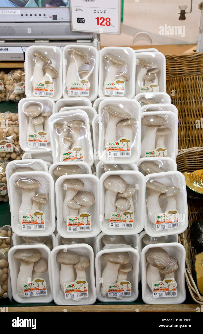 Pre packed raw shiitake mushrooms in a supermarket in Japan Stock Photo