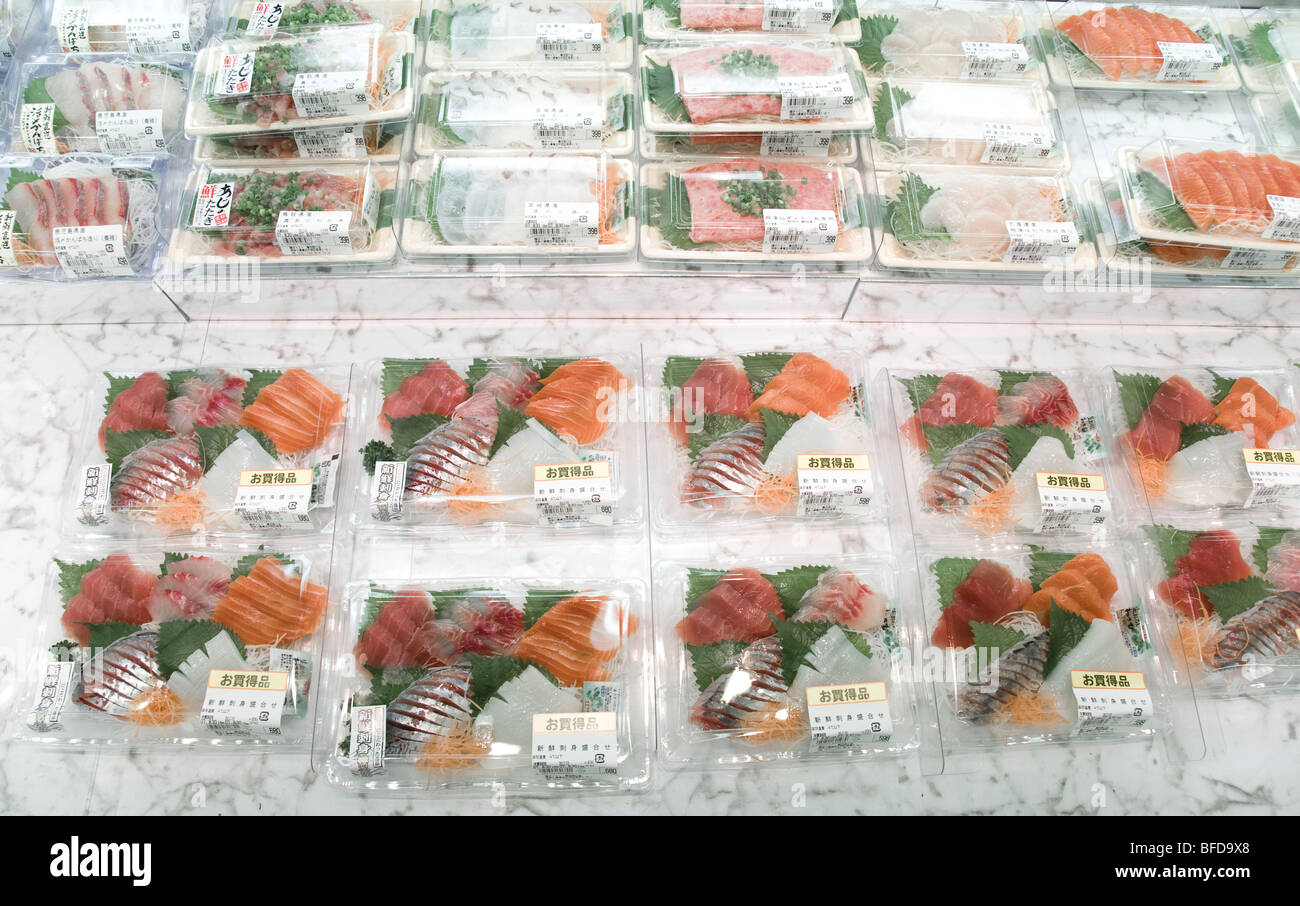 Pre packed mixed raw sashimi fish in a supermarket in Japan Stock Photo