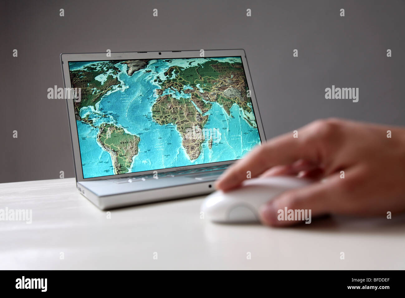 World map on computer screen Stock Photo