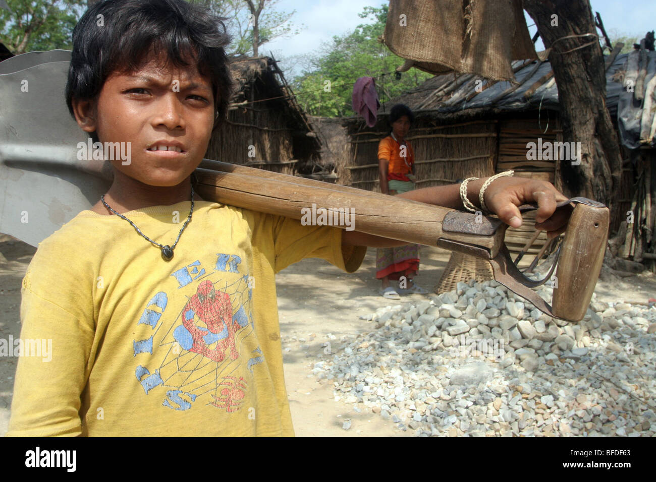 Kids crushing gravel to provide family income in Hetauda, Nepal. Stock Photo