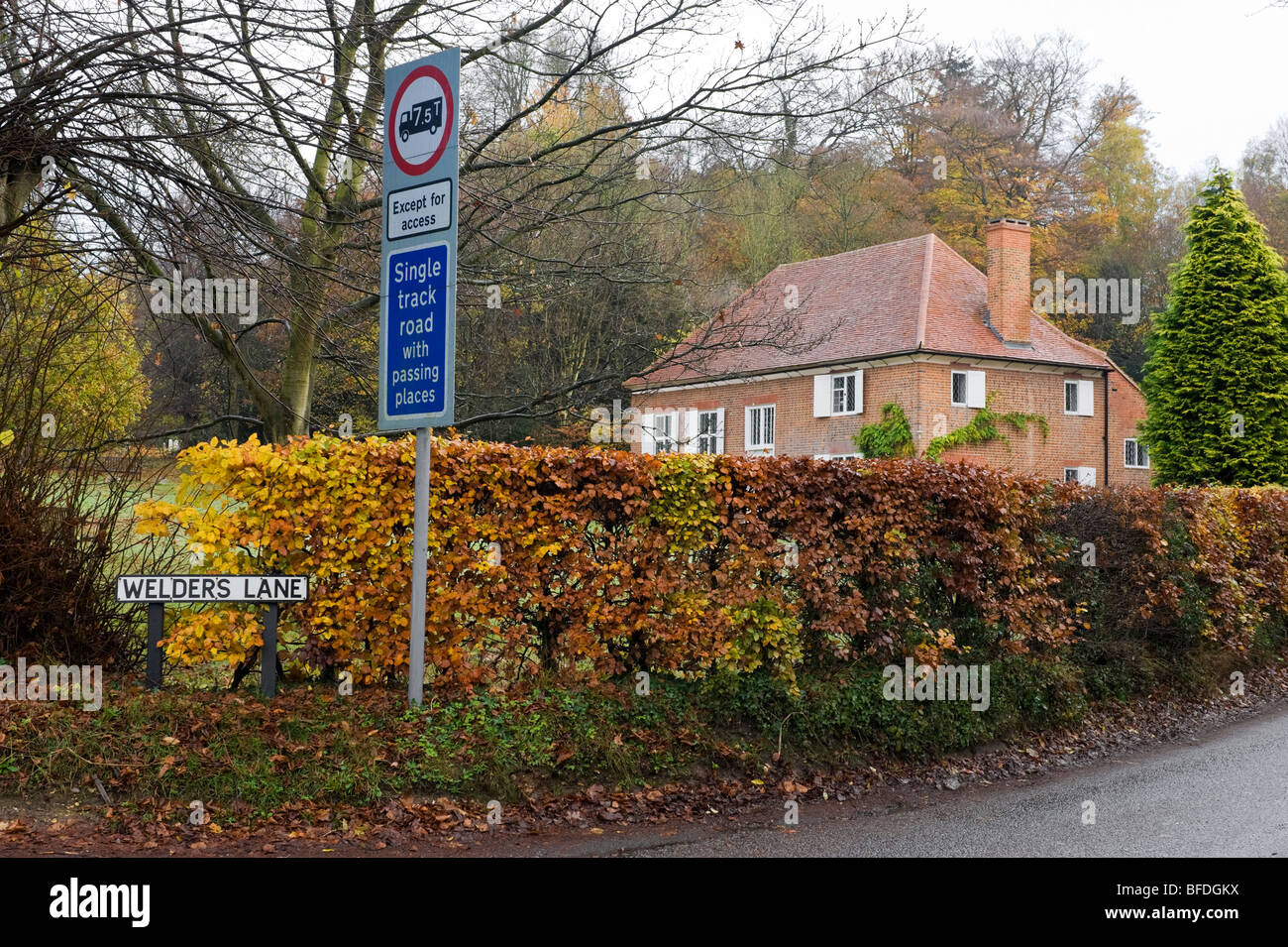 Quaker meeting house and single track road sign at the junction of Welders Lane and Jordans Lane Bucks UK Stock Photo