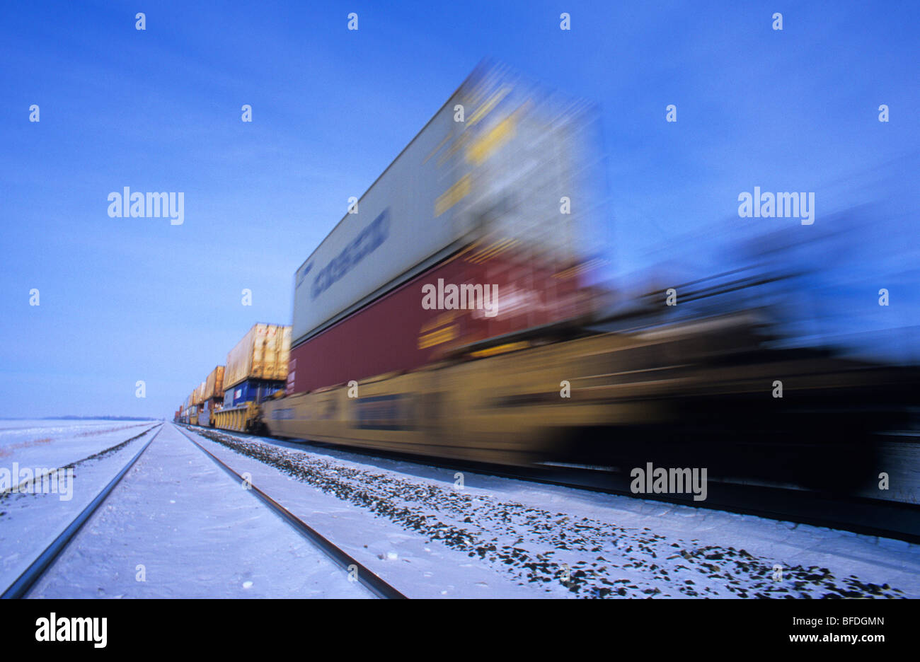 Freight containers on moving train near Oakbank, Manitoba, Canada Stock Photo