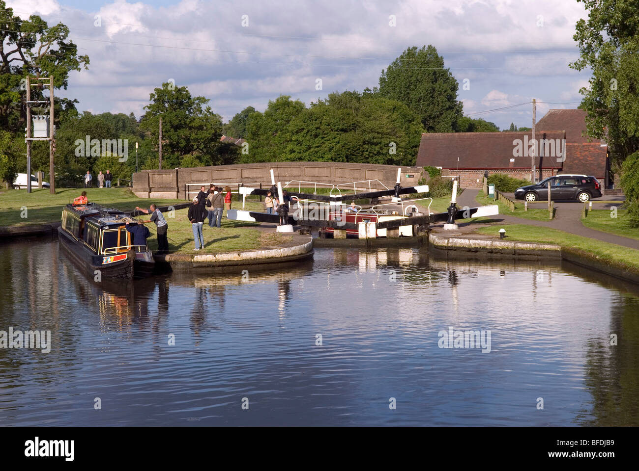 The Hatton Flight of locks is on the Grand Union Canal. There are 21 locks in the space of two miles of waterway. Stock Photo