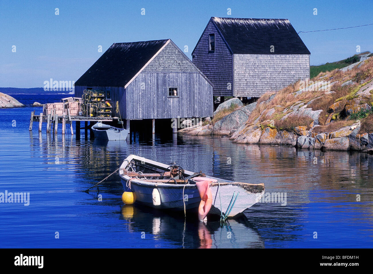 Fishing boat and sheds, Peggy's Cove, Nova Scotia, Canada Stock Photo