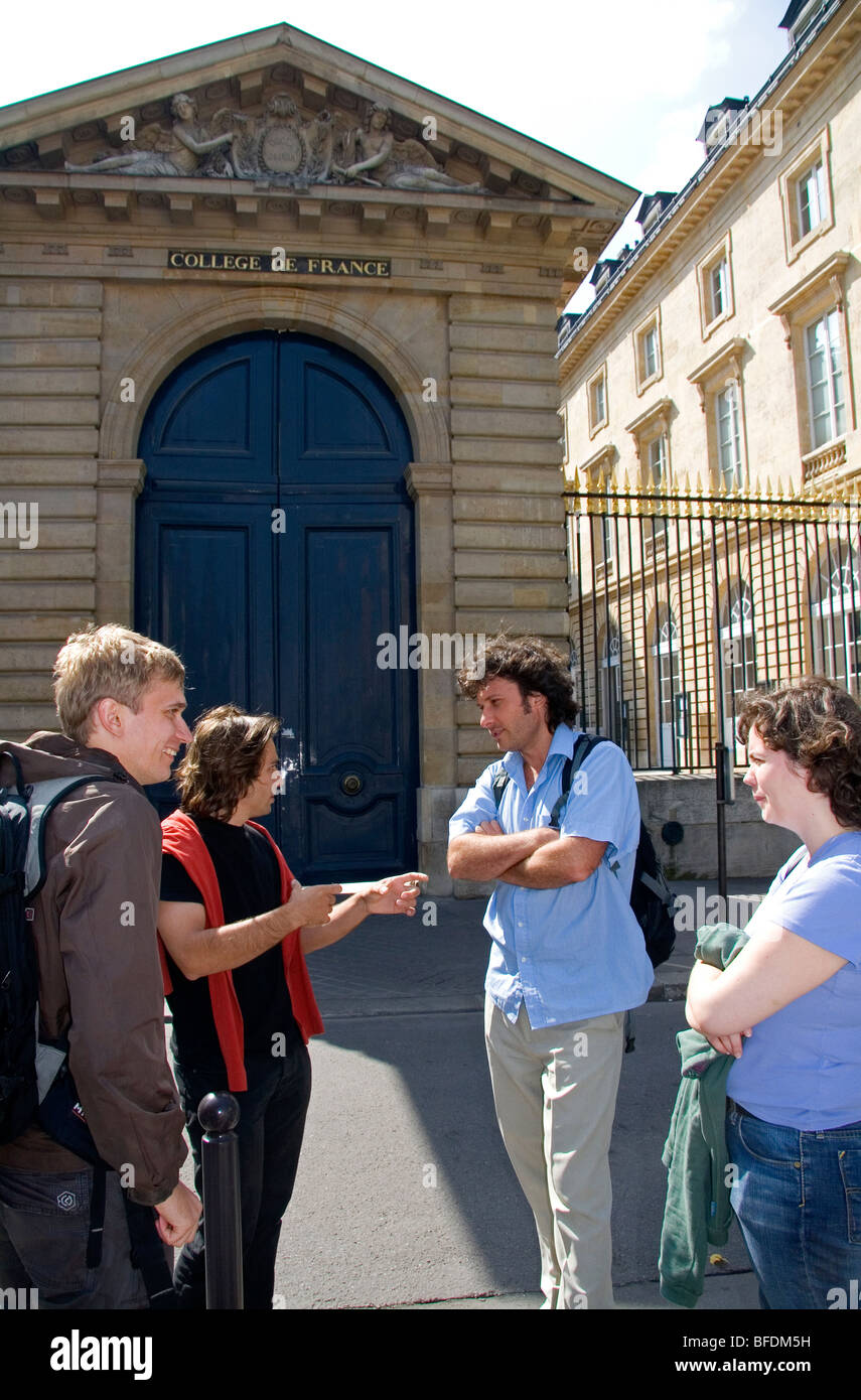 Students socialize at the College de France located in the Latin Quarter of Paris, France. Stock Photo