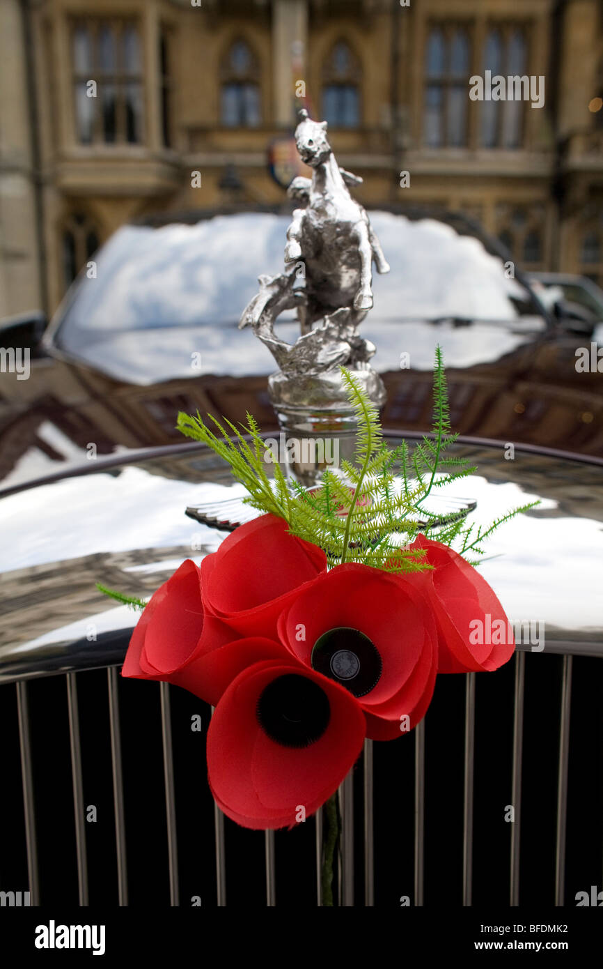 Remembrance poppies on the bonnet of Britain's Queen Elizabeth's official Bentley on Armistice day Stock Photo