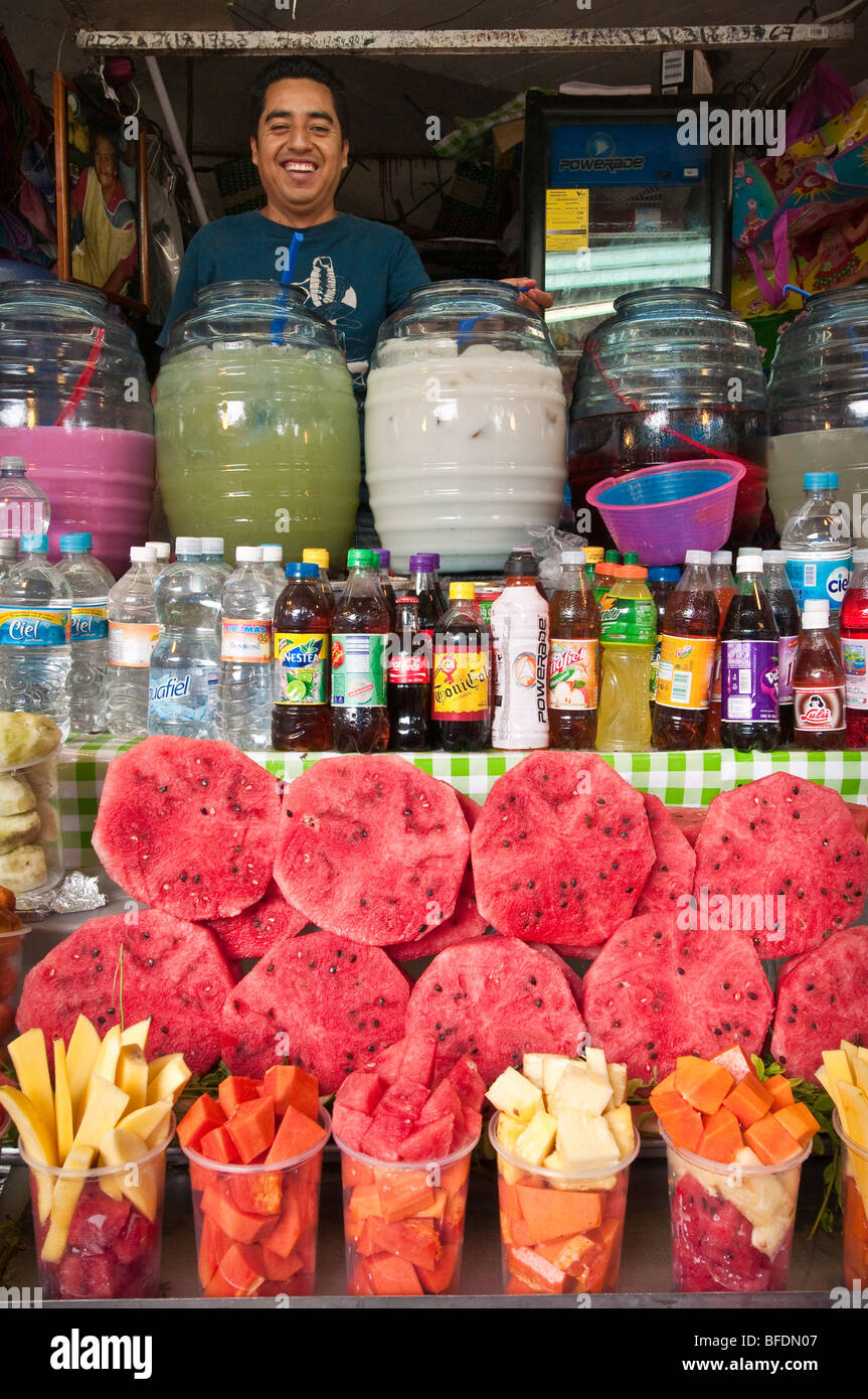 Fresh fruit and juice vendor at Mercado Libertad, Guadalajara, Mexico. Stock Photo