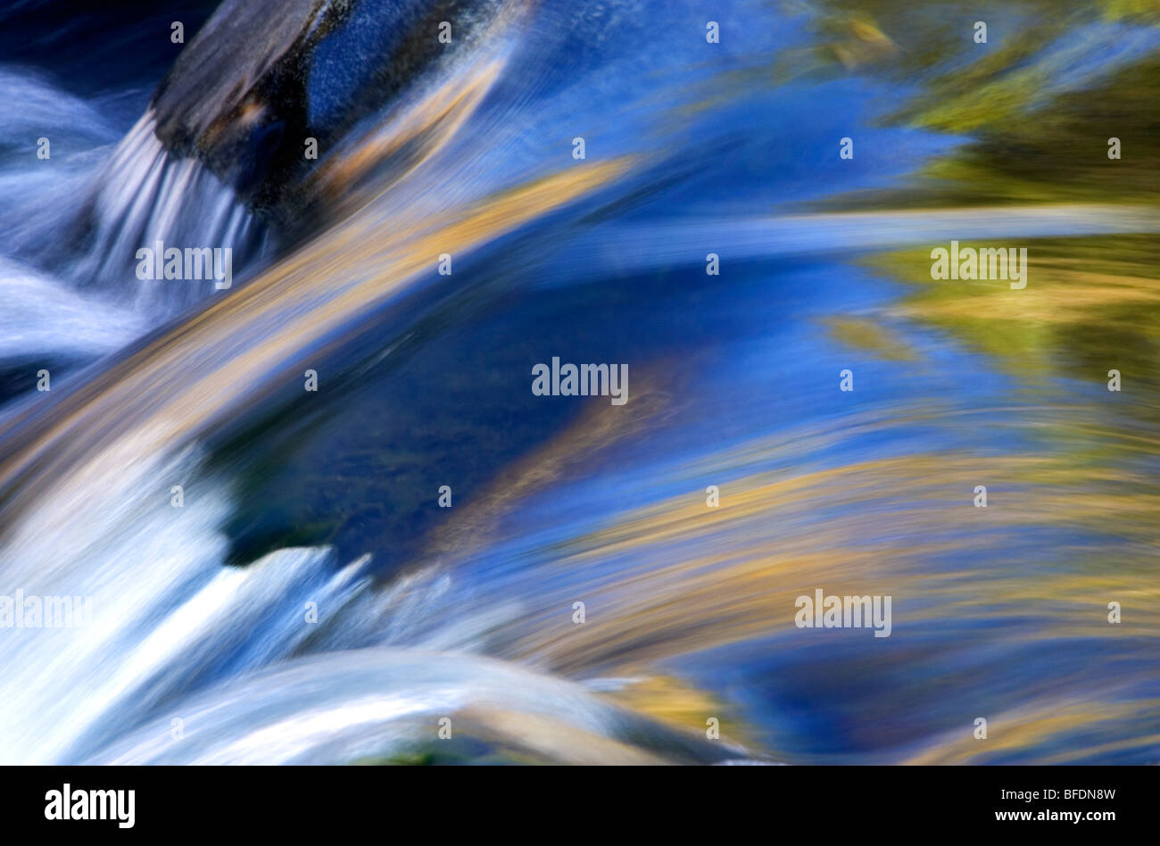 Abstract of water in Bridge Creek, Centennial Park, 100 Mile House, British Columbia, Canada Stock Photo