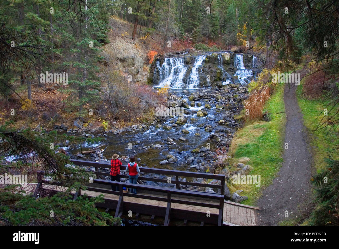 Tourists viewing Bridge Creek Falls in Centennial Park, 100 Mile House