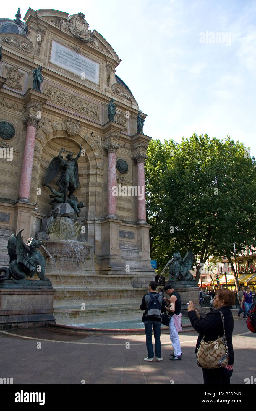 The Fontaine Saint-Michel located in the Place Saint-Michel, Paris, France. Stock Photo