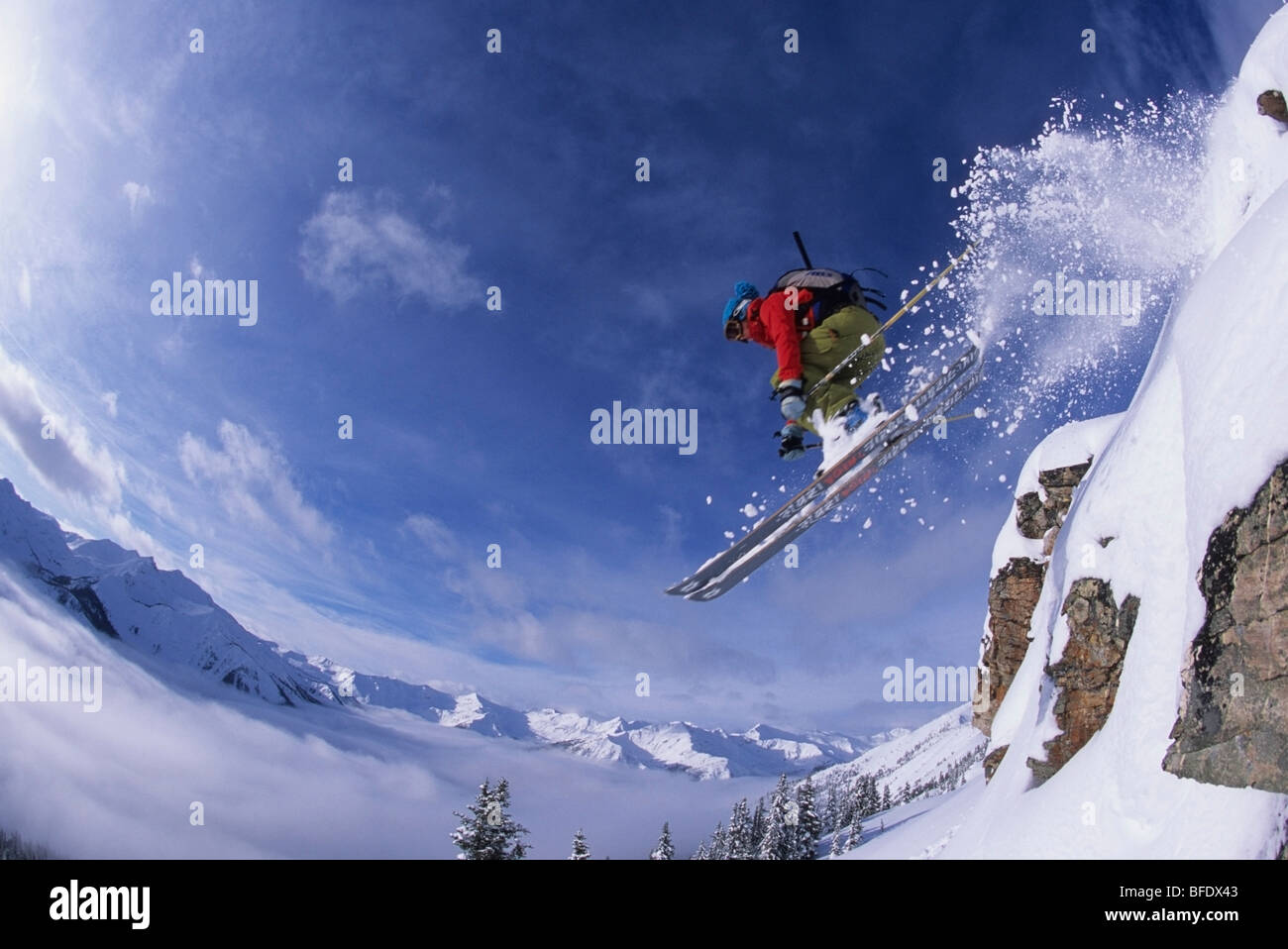 Airborne skier in the backcountry of Kicking Horse Resort, Golden, British Columbia, Canada Stock Photo