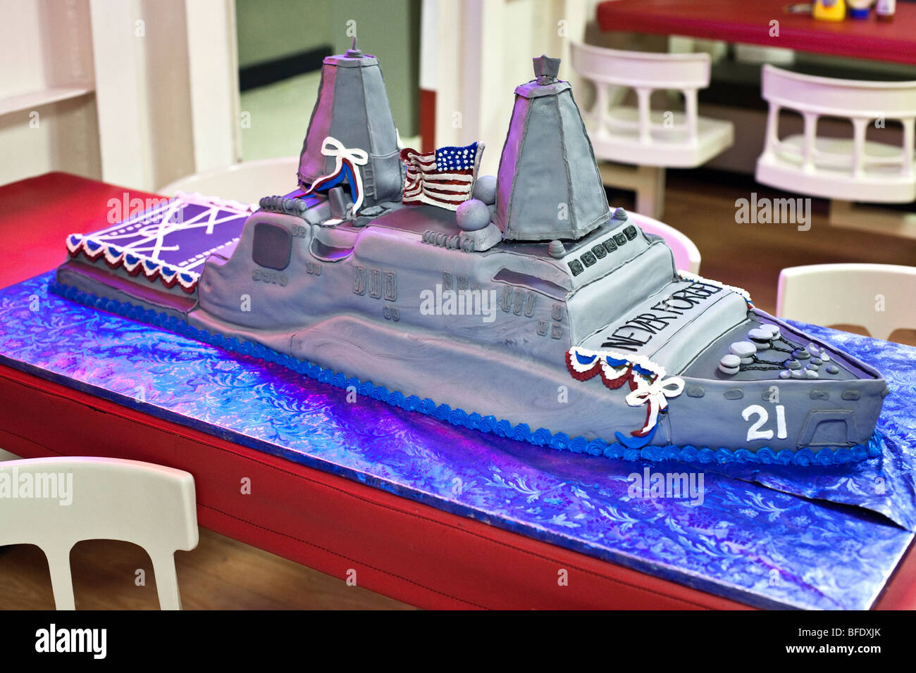whimsical cake replica of USS New York iced in battleship gray baked by a crew member & proudly displayed in the enlisted mess Stock Photo