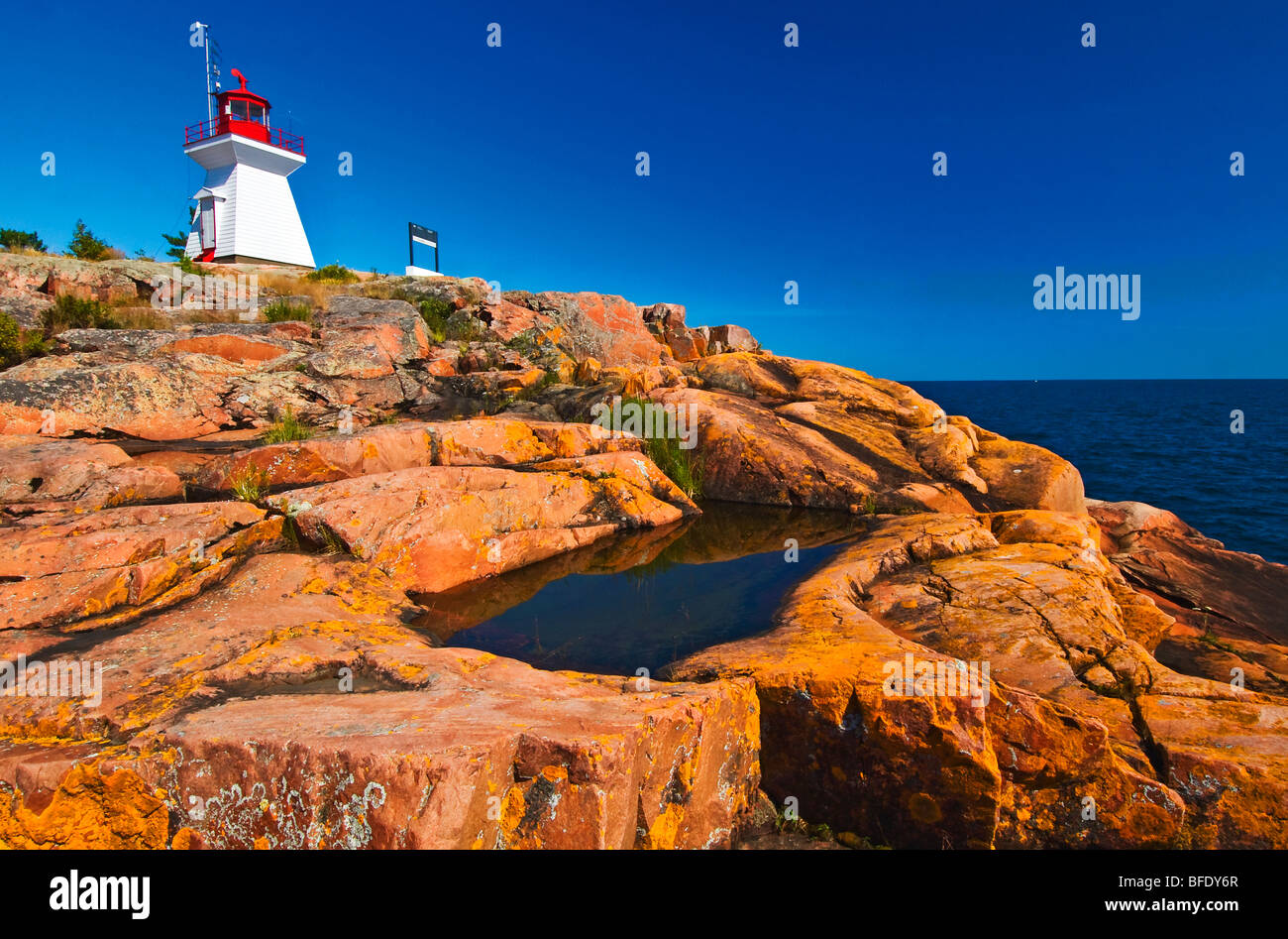 Lighthouse on pre-cambrian shield by Georgian Bay, Killarney Provincial Park, Ontario, Canada Stock Photo