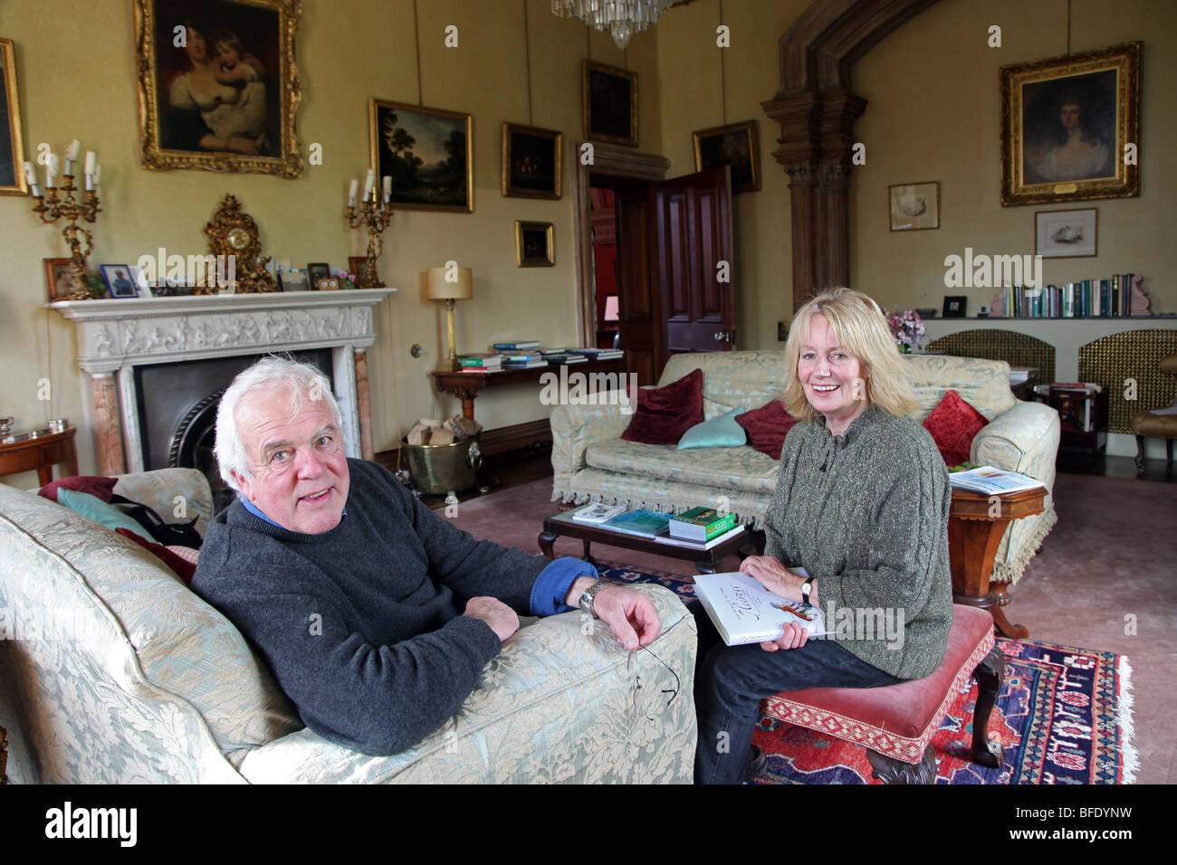 Johnny and Lucy Madden in the drawing room of Hilton Park, Irish stately home of the Madden family Stock Photo