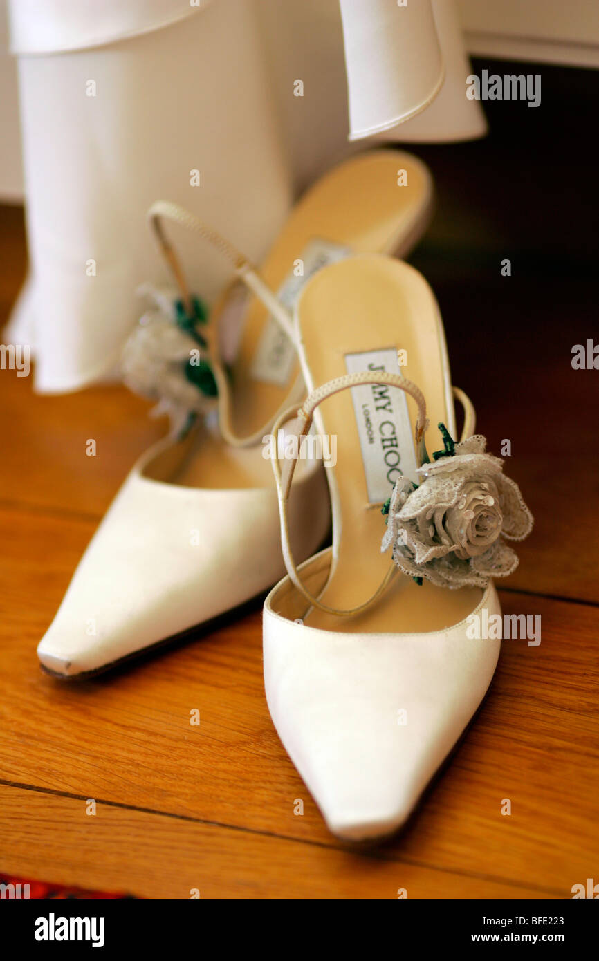 Jimmy Choo white wedding shoes for a bride Stock Photo - Alamy
