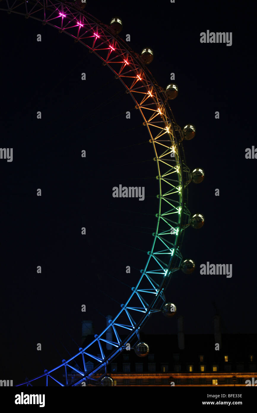Millennium Wheel in London, England, illuminated in rainbow lights to celebrate gay Pride in London Stock Photo
