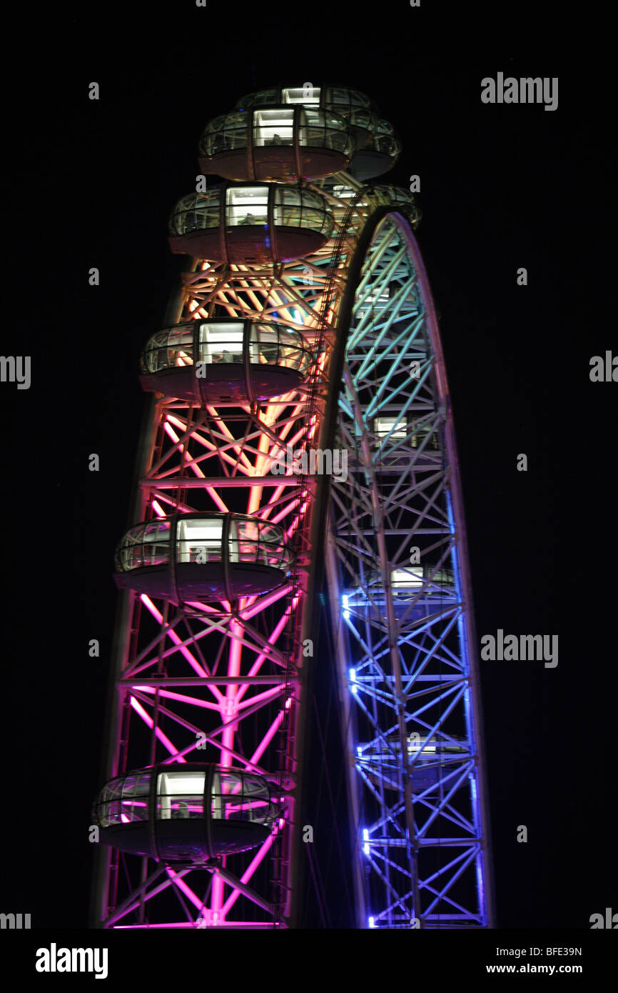 Millennium Wheel in London, England, illuminated in rainbow lights to celebrate gay Pride in London Stock Photo