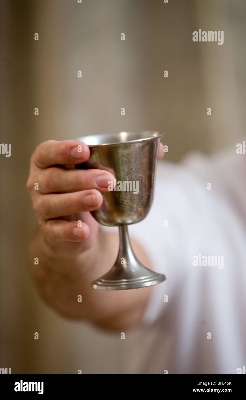 Silver wine cup at Seder Night. Stock Photo