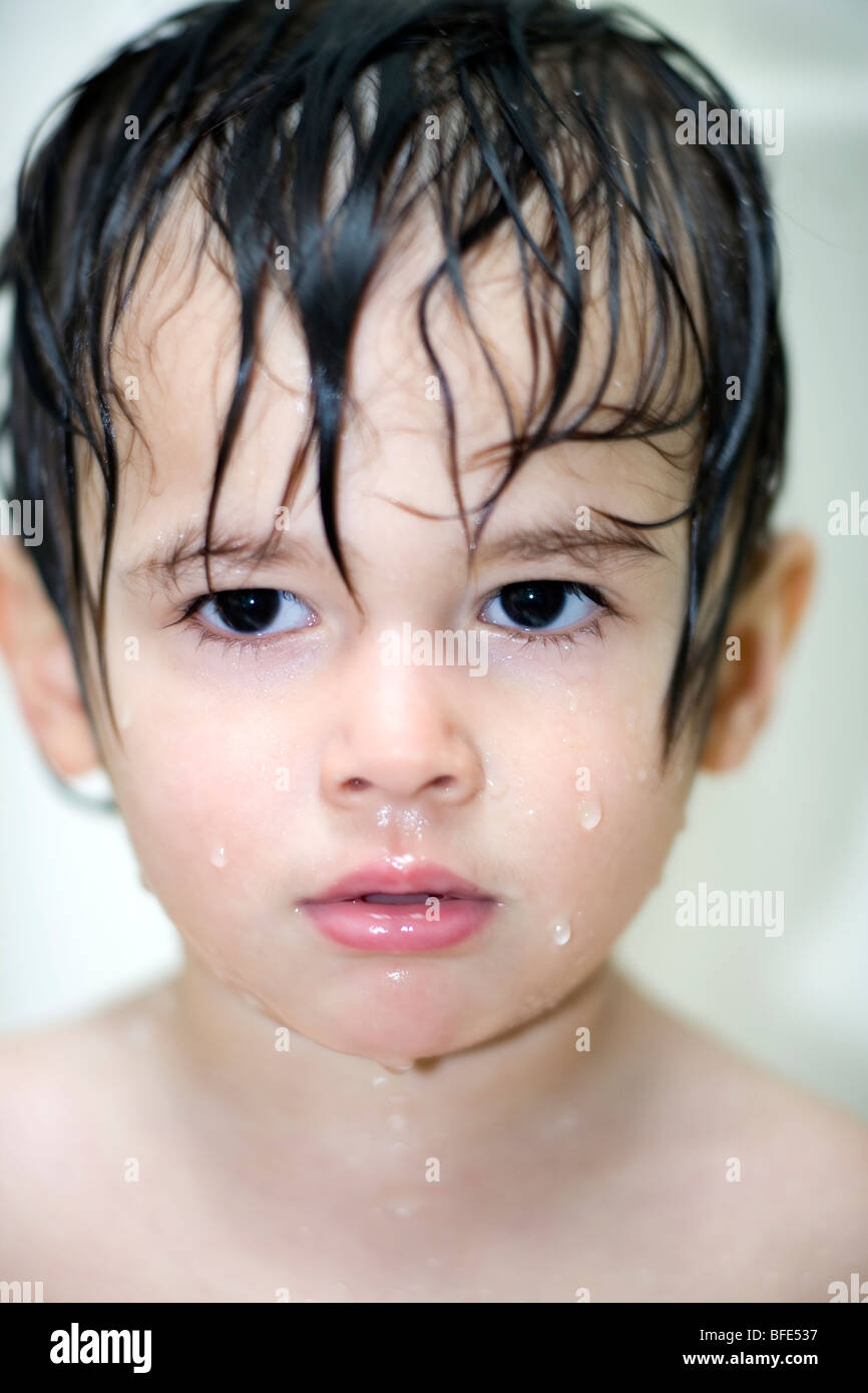 Head shot of 2 1/2 year old boy in the shower, Montreal, Quebec, Canada Stock Photo