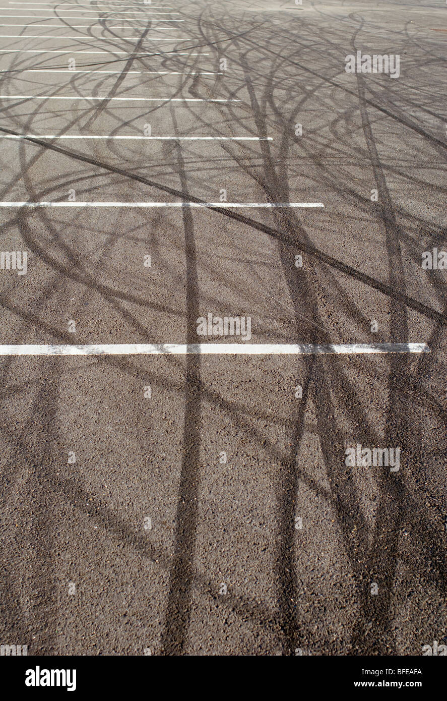 Skid marks on tarmac in a car park at Black Rock, Brighton, England. Stock Photo