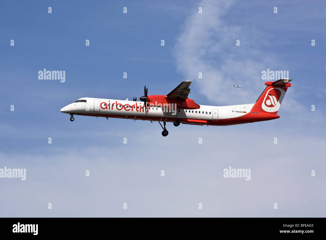 A De Havilland Canada Dash 8 turbo prop airliner of the German airline Air Berlin on final approach Stock Photo