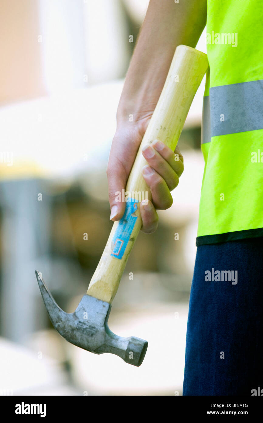 Detail of a woman's hand with hammer Stock Photo Alamy