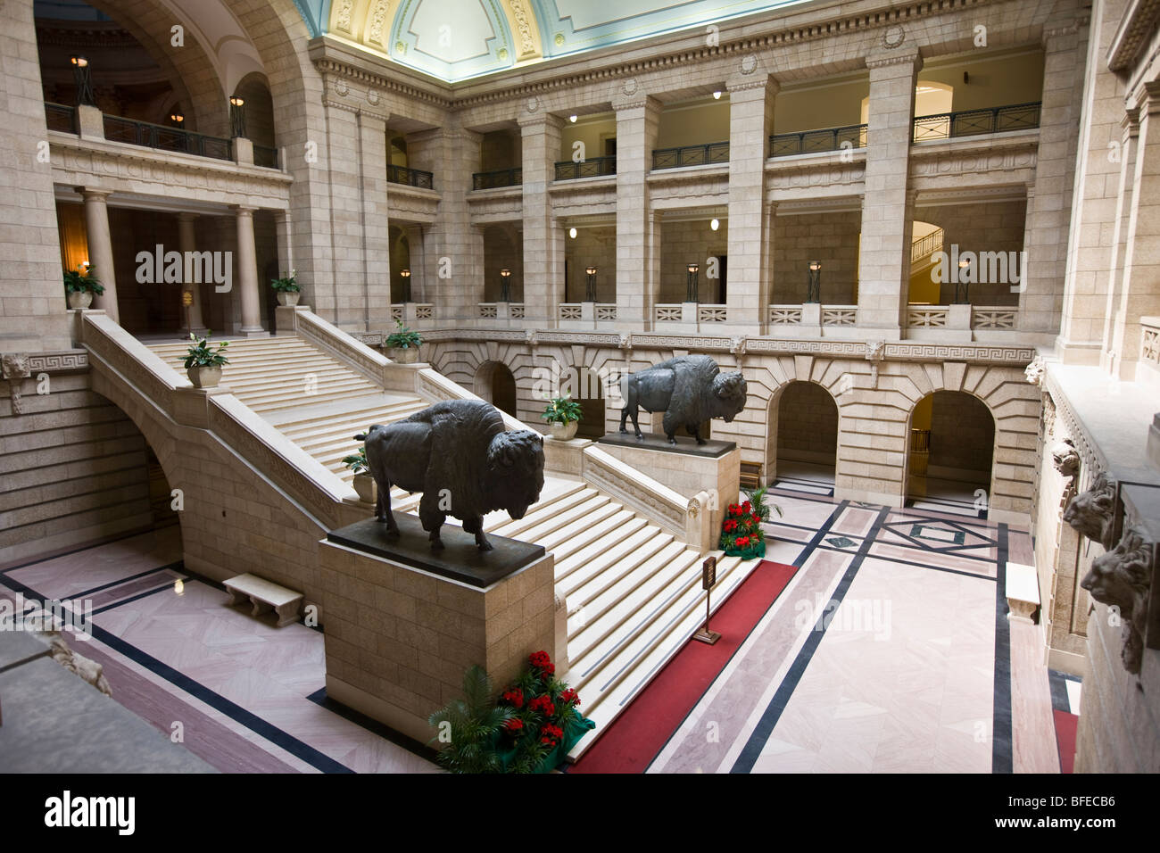 Grand Staircase of Legislative Building flanked on each side by life-sized bronze statues of two North American Bison Winnipeg M Stock Photo