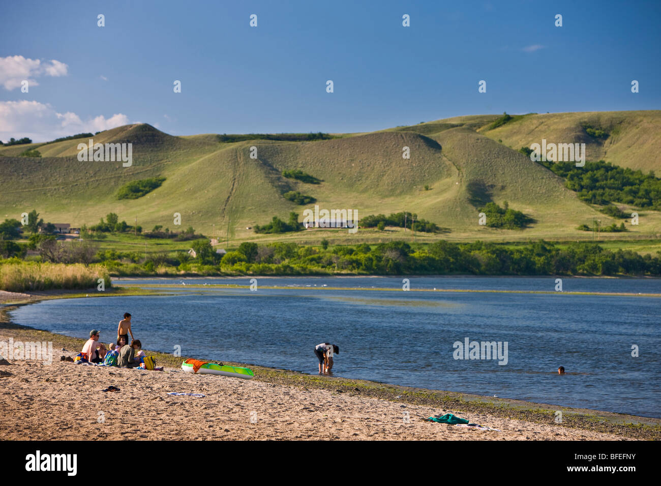 People on the shores of Echo Lake in Echo Valley Provincial Park Stock