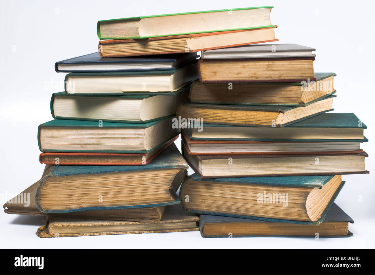 A pile of old hardback books Stock Photo