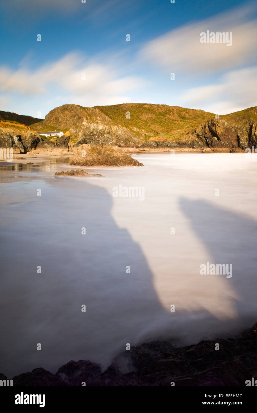 Kynance cove; with shadows on the sea and shore; Cornwall Stock Photo