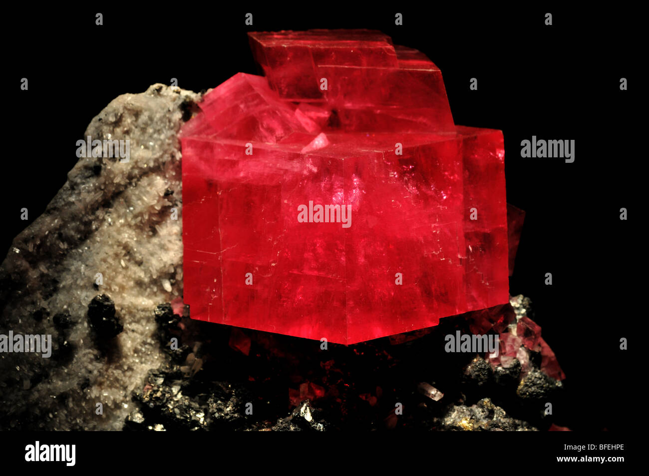 Red rhodochrosite crystals, manganese carbonate (MnCO3). Stock Photo