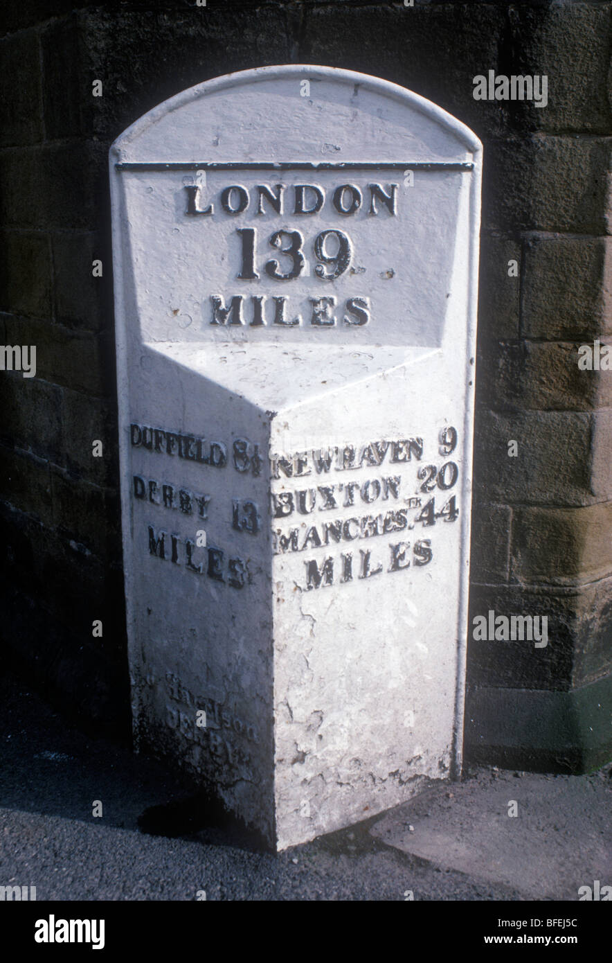 Ashbourne Derbyshire northern England, Uk. Milestone with distance to London, 139 miles also other towns Stock Photo