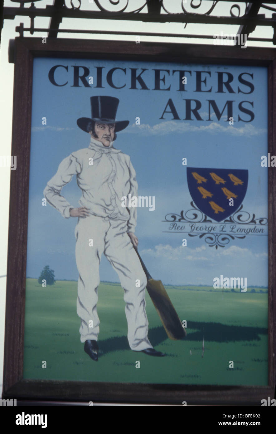 Wisborough Green Sussex UK Pub sign  for Cricketers Arms depicting Victorian cricket player Rev George Langdon Stock Photo