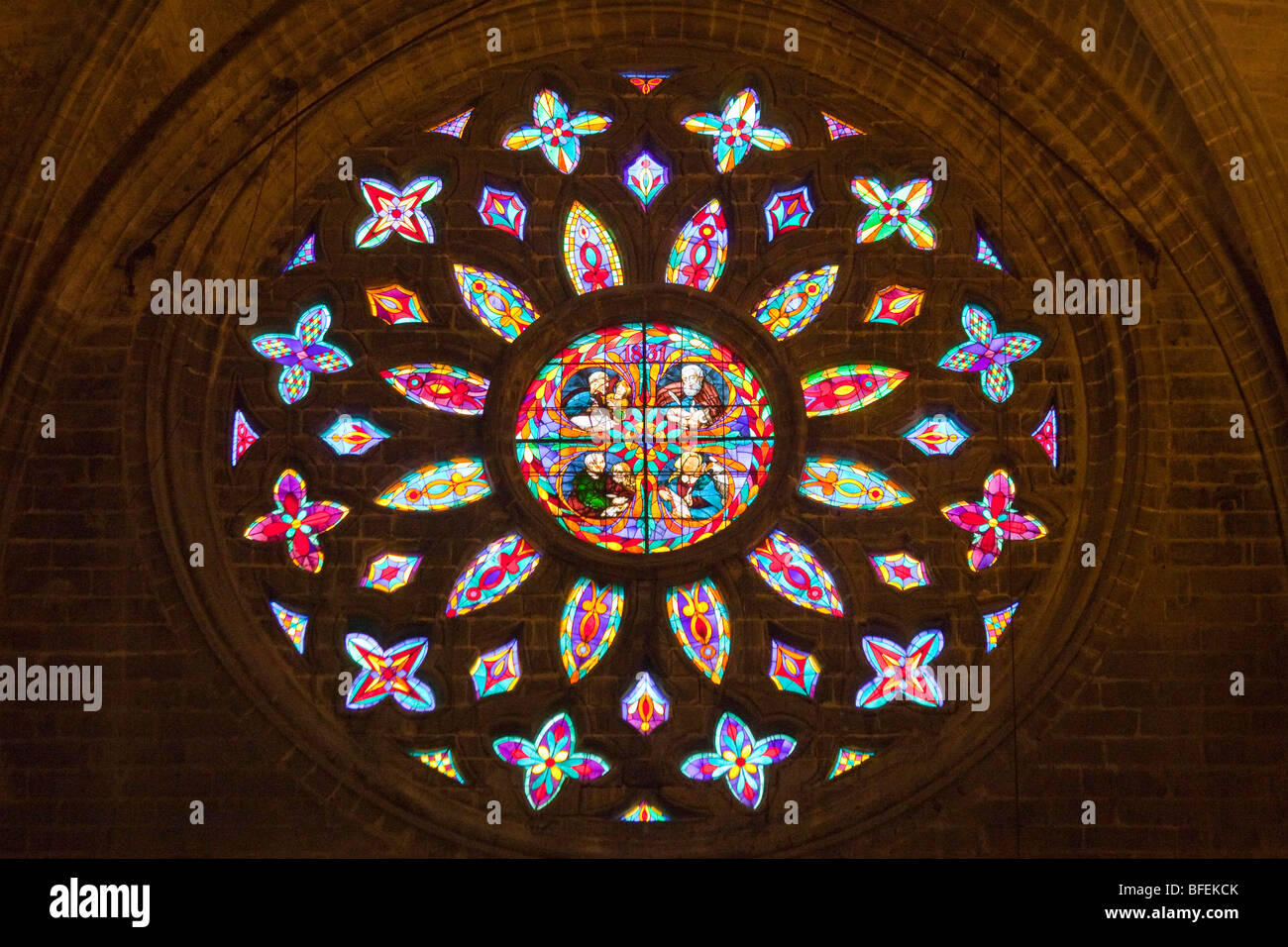 Stained Glass Window at the Cathedral of Seville in Spain Stock Photo