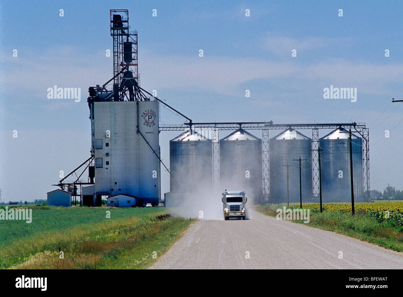 A grain truck leaves an inland grain terminal after delivering a load of grain near Winnipeg, Manitoba, Canada Stock Photo
