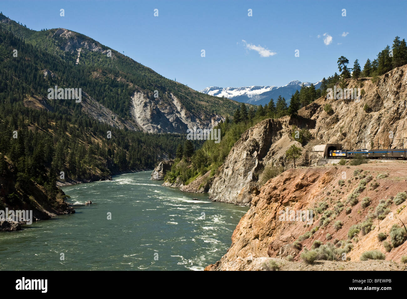 Passenger train going through a tunnel in the Thompson Canyon in British Columbia, Canada Stock Photo