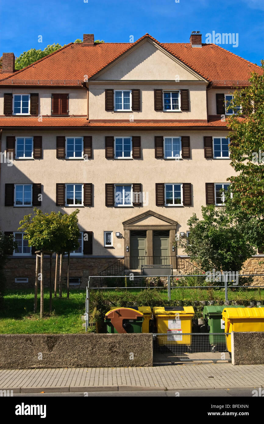 Recycling bins in front of an apartment building, Jena, Germany Stock