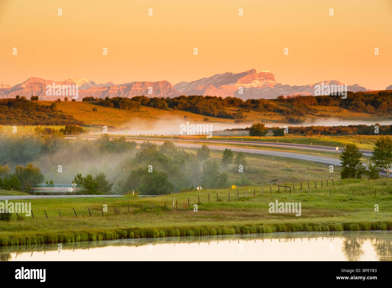 Country road and sunrise, Cochrane, Alberta, Canada