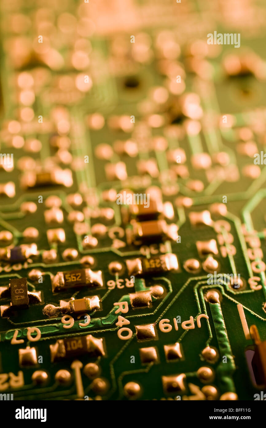 Close-up of a green and gold colored Computer Circuit Board Stock Photo ...