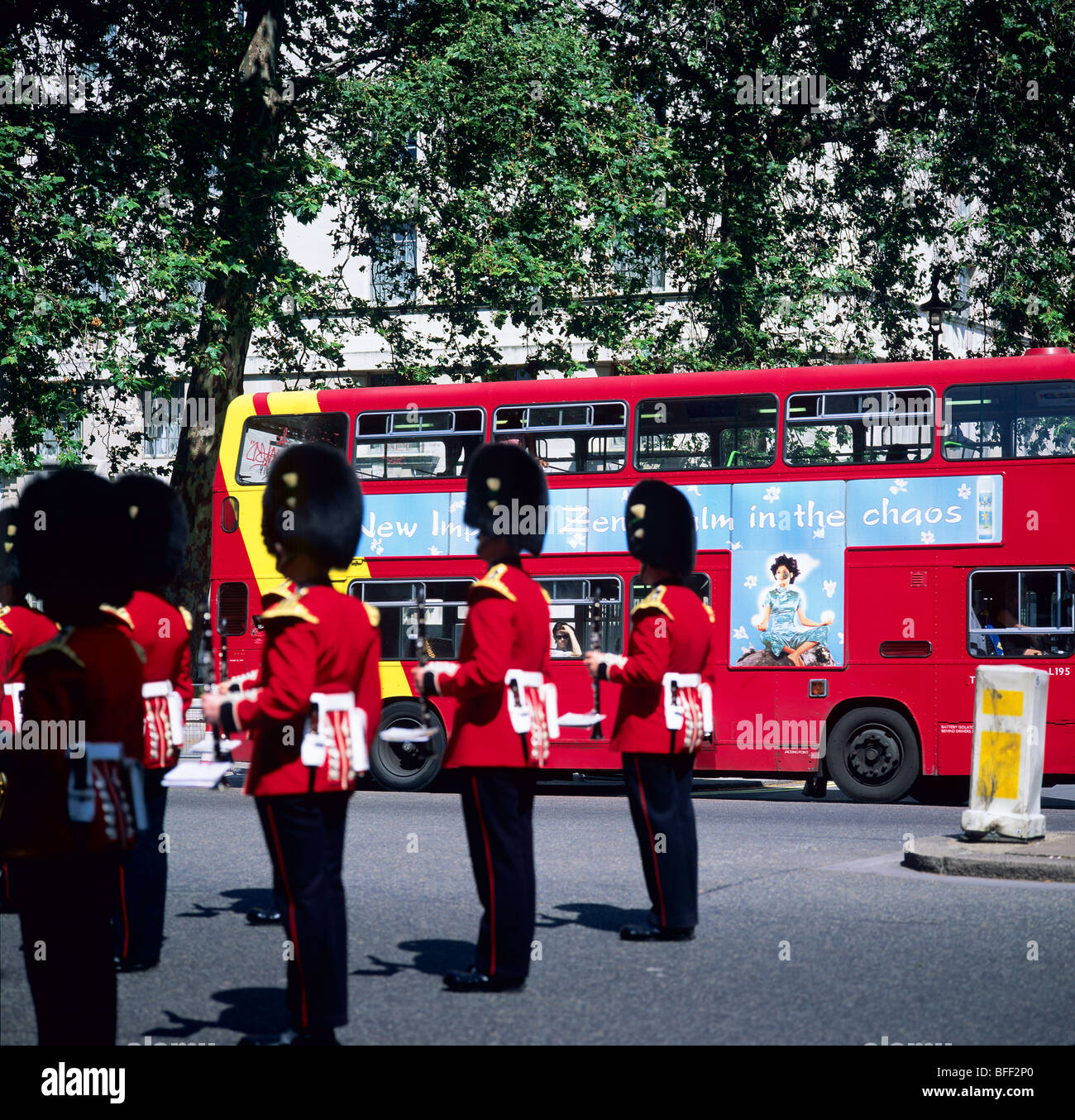 Royal Welsh guards marching band and double decker bus London Great Britain Stock Photo