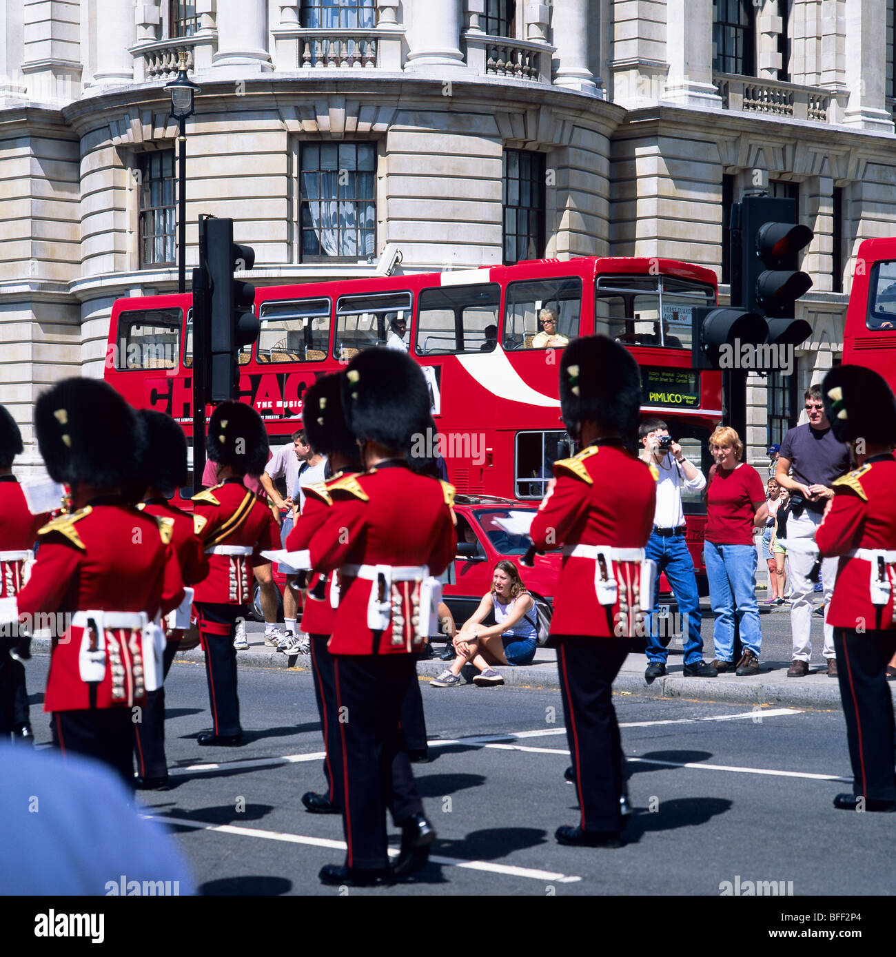 Royal Welsh guards marching band and double decker bus London Great Britain Stock Photo