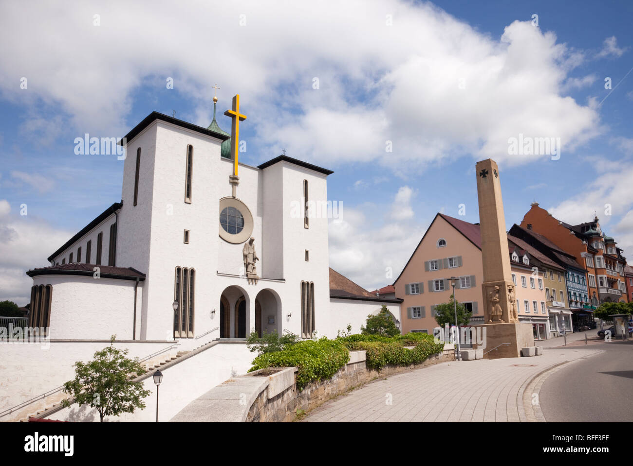 War memorial and large modern white church in historic small town of Stockach, Baden Wurttenburg, Germany, Europe. Stock Photo