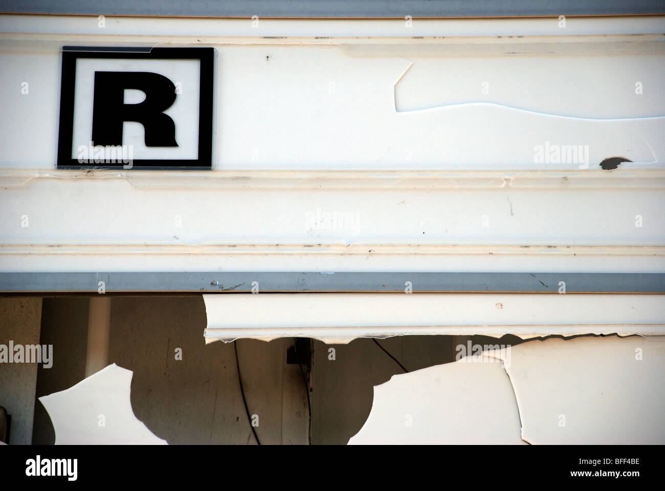 Rated R, found type on broken cinema marquee Stock Photo