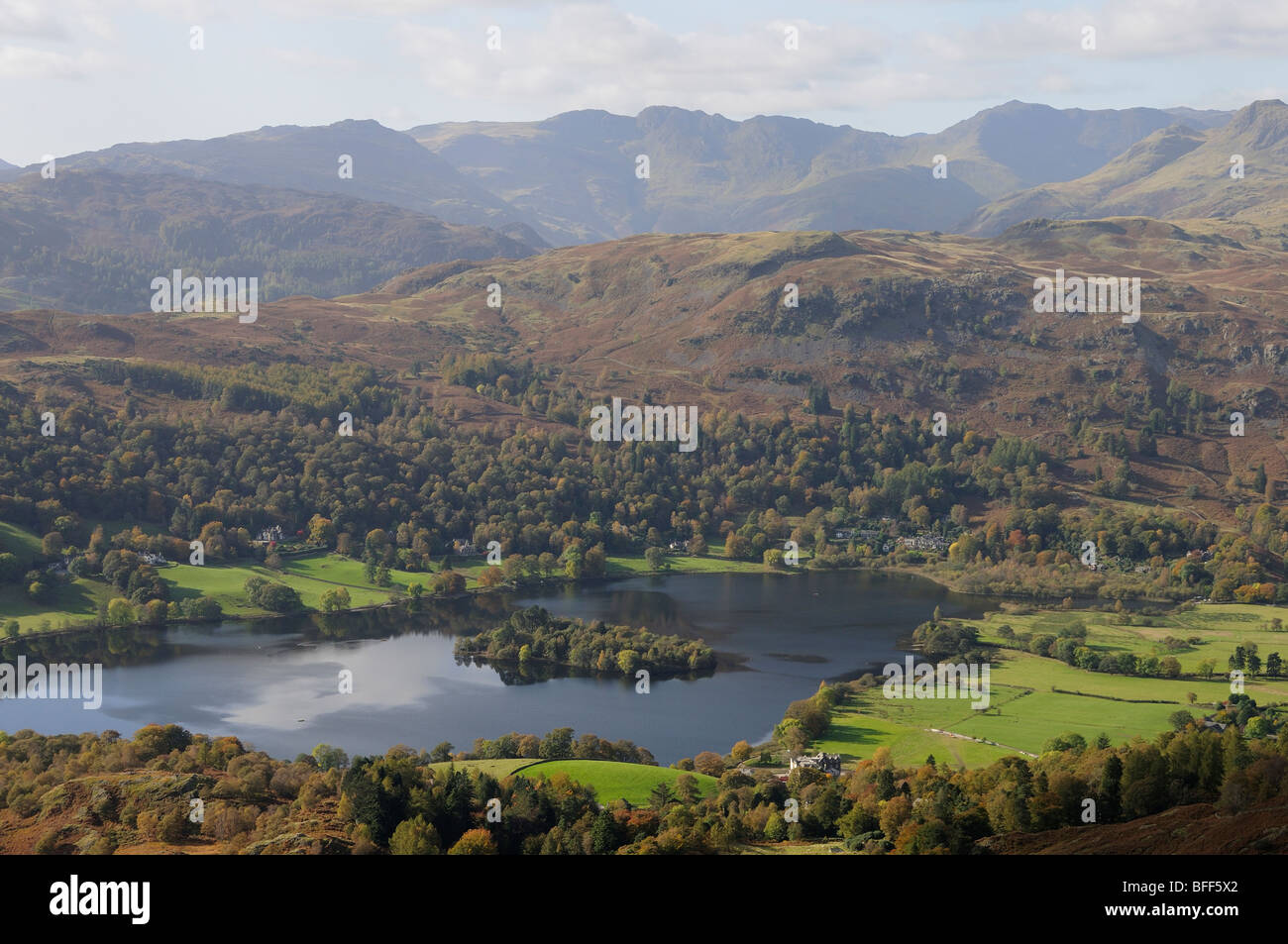 Looking over Grasmere Lake to Silver How, Crinkle Crags and Bowfell in the English Lake District Stock Photo