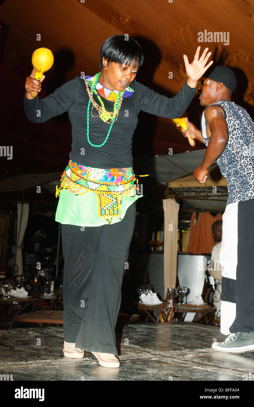 Beaded dressedof a Zulu young adult girl dancing, Moyo Restaurant, Spier wine farm, West Cape, South Africa, November, 2009 Stock Photo