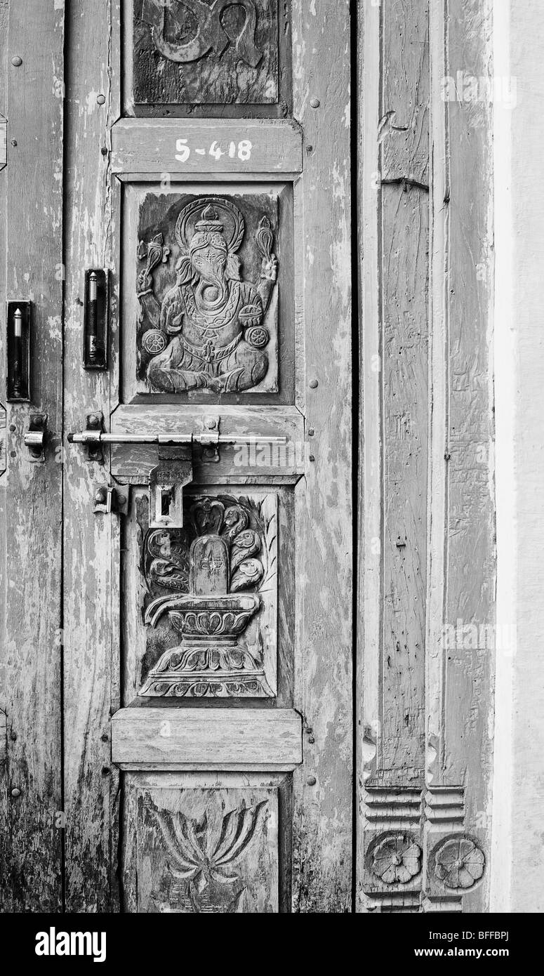 Old Indian carved house front door. Black and White Stock Photo