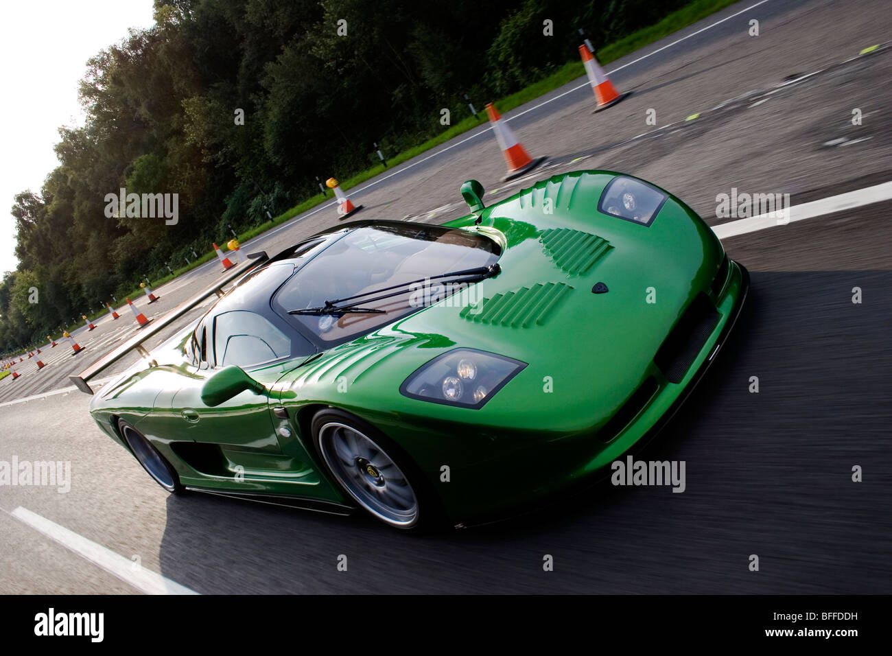 Green Mosler MT900 GTR American supercar driving fast Stock Photo