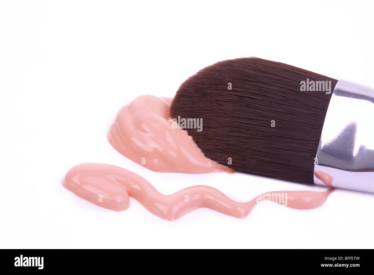 Make-up brush with foundation Stock Photo