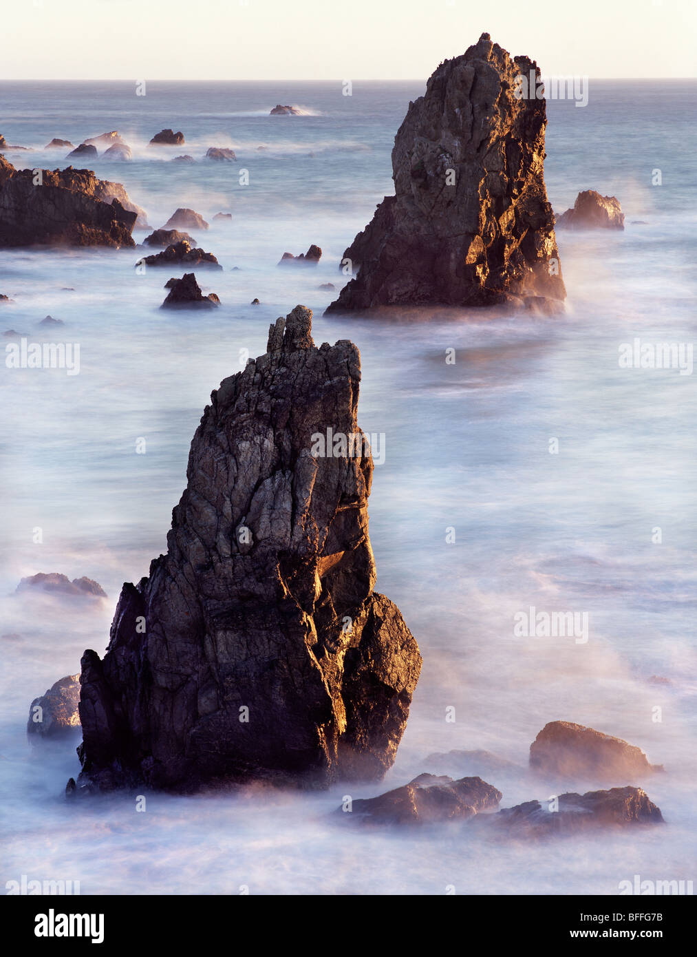 ocean cove with sea stacks during sunset, Big Sur California USA Stock ...